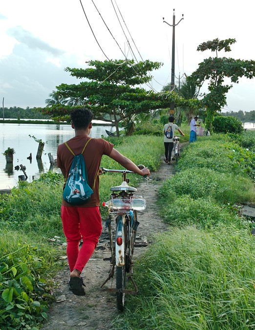 Migrant fishermen cycling