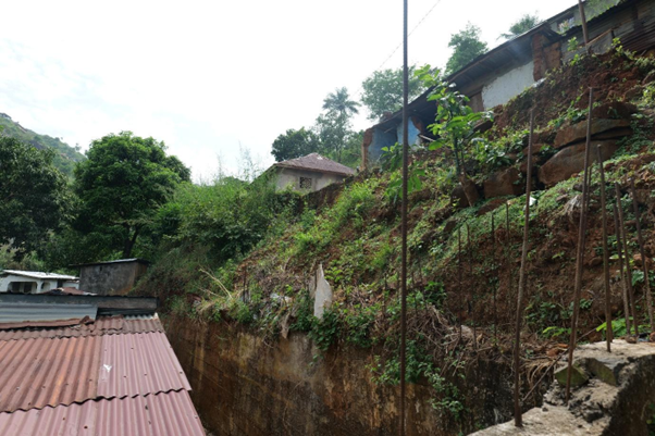 A steep slope at the back of Bintu's house, Photo credit: Ishmail Conteh